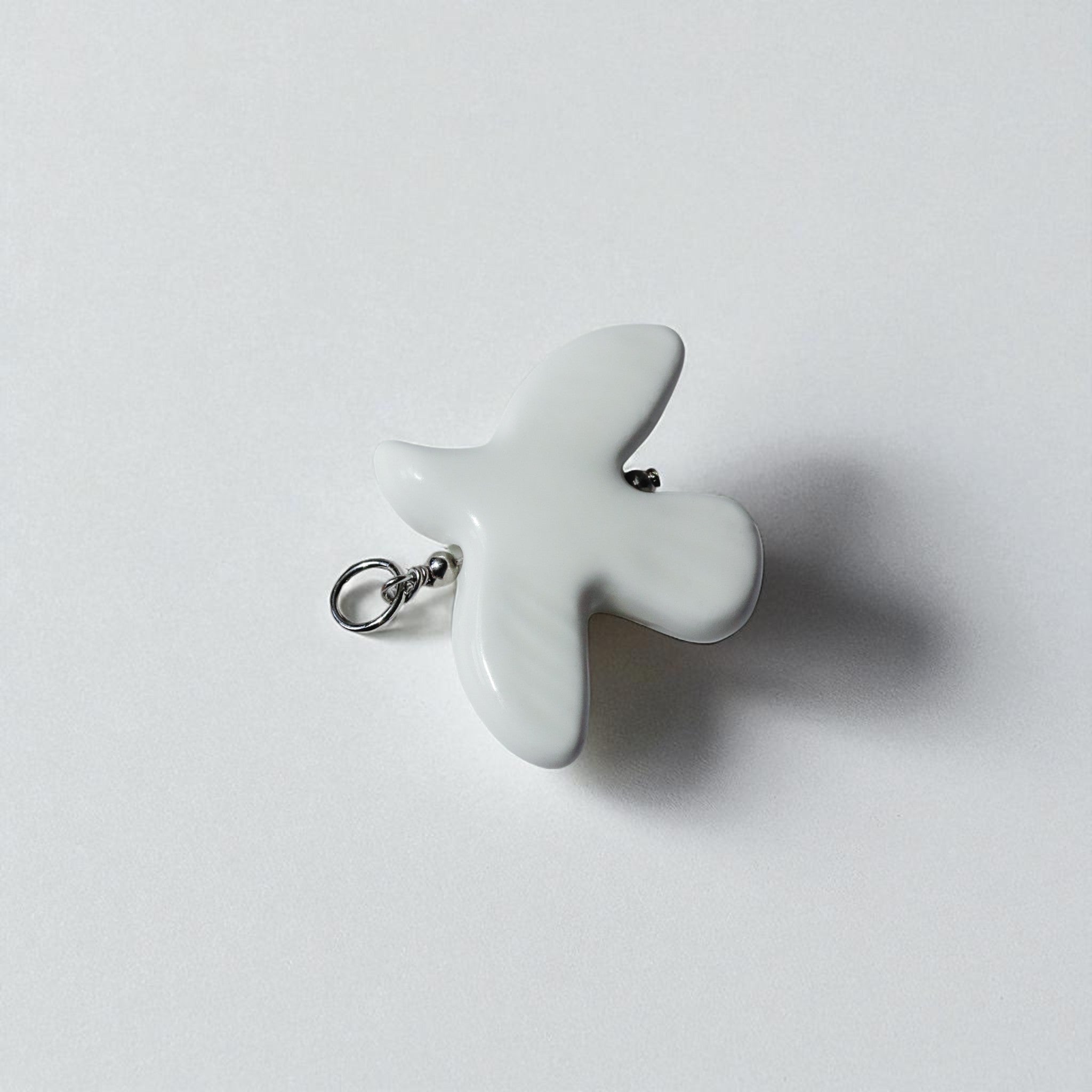 Peacewing Charm