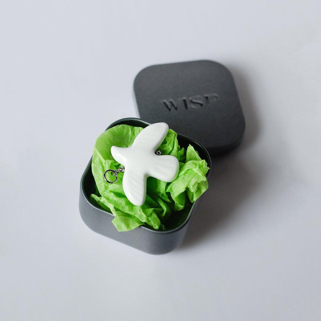 Peacewing Charm