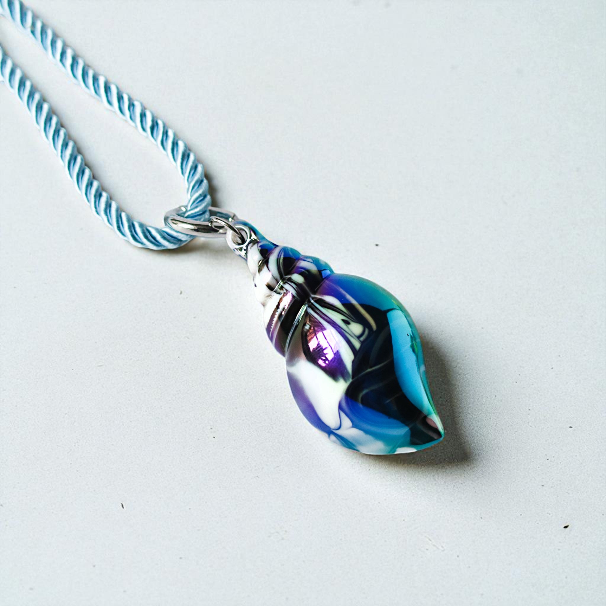 Oil Shell Charm